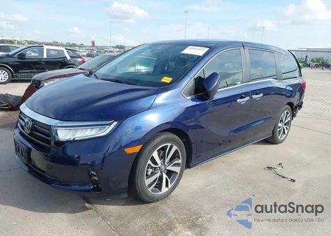 2023 Honda Odyssey Touring z USA, uszkodzony, nr VIN 5FNRL6H88PB052824